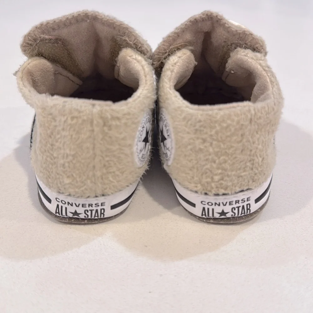 Converse Chuck Taylor All Star Cribster baby shoes with a soft, fuzzy upper